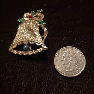 Elegant Gold Bell Brooch with Red and Green Accents